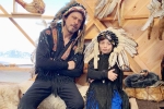 Native American War Bonnets, gauri khan, shah rukh khan and his son abram trolled for sporting native american war bonnets, Native american