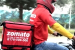 Zomato breaking updates, Zomato profits, zomato has half its net loss, Zomato